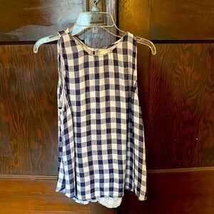 Breezy gingham woven sleeveless summer top with button neck comfy and cute!